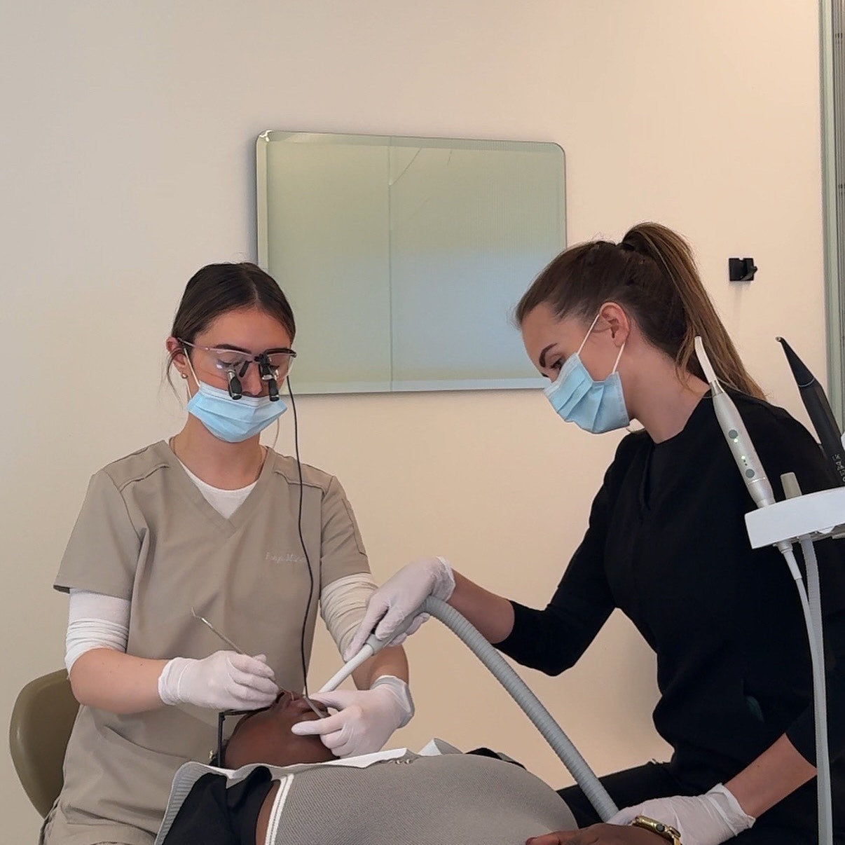 Freya Milnes Dental Therapist and Happythreads content creator wearing khaki scrubs