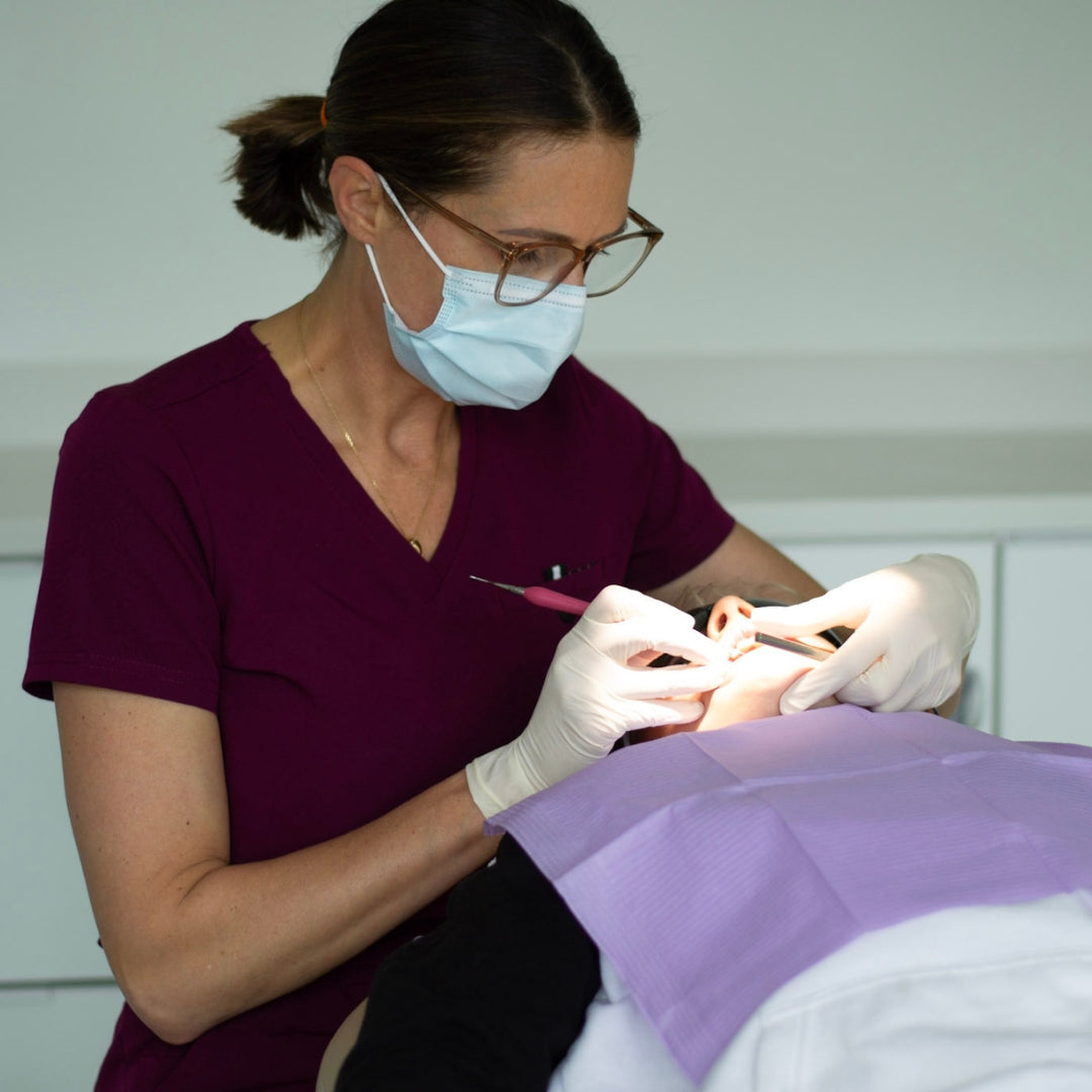 International Infection Prevention Week 2025 - Dentist wearing hygiene mask
