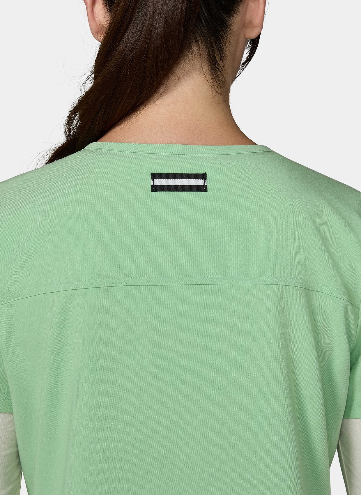 Women's Koi Next Gen Hustle and Heart Scrub Top in Pistachio