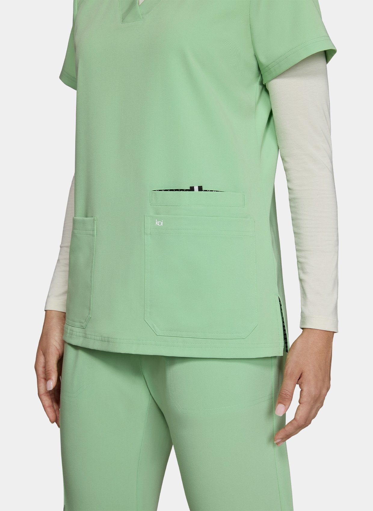 Women's Koi Next Gen Hustle and Heart Scrub Top in Pistachio